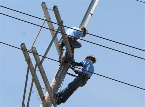 Higher electricity rates seen as San Miguel ends deal .